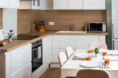 Cuisine ou kitchenette dans l'établissement La Pause Tourangelle - Calme - Wifi - Parking