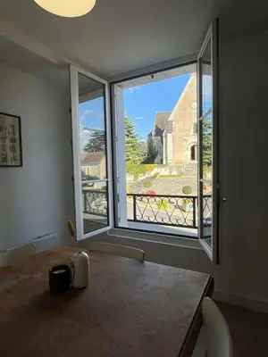 Un ou plusieurs lits dans un hébergement de l'établissement LE CHOEUR DE FRANCUEIL - T2 avec vue