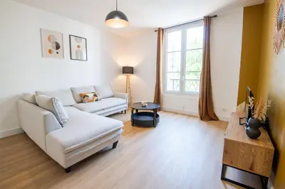 Coin salon dans l'établissement LE CHOEUR DE FRANCUEIL - T2 avec vue