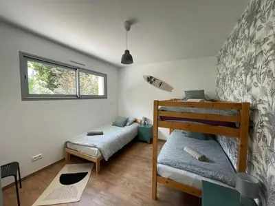 Un ou plusieurs lits dans un hébergement de l'établissement La Villa Atea