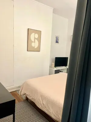 Un ou plusieurs lits dans un hébergement de l'établissement ZACH & Appart 4 Pers Tours Centre