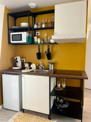 Cuisine ou kitchenette dans l'établissement Studio Pep's - Futuroscope 20min - 2 personnes et enfants