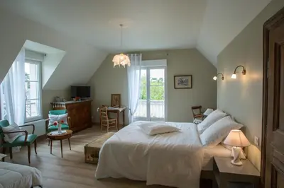 Un ou plusieurs lits dans un hébergement de l'établissement La Maison du Carroir