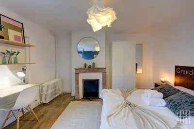 Un ou plusieurs lits dans un hébergement de l'établissement Grand Appartement - Proche Bord de Loire - Wifi
