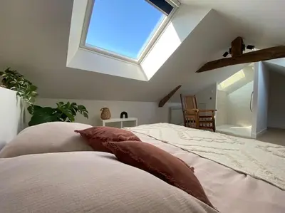Un ou plusieurs lits dans un hébergement de l'établissement Duplex cinéma - centre historique Tours