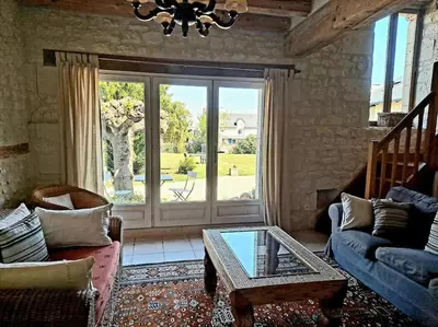 Coin salon dans l'établissement Le Clos du Tilleul