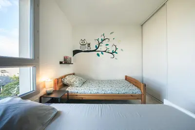 Un ou plusieurs lits dans un hébergement de l'établissement Le Logis Madeleine - Maison Cosy