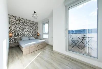 Un ou plusieurs lits dans un hébergement de l'établissement Le Logis Madeleine - Maison Cosy