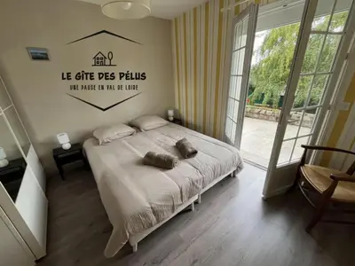 Un ou plusieurs lits dans un hébergement de l'établissement Le gîte des pélus