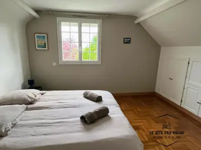 Un ou plusieurs lits dans un hébergement de l'établissement Le gîte des pélus
