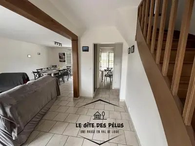 Coin salon dans l'établissement Le gîte des pélus
