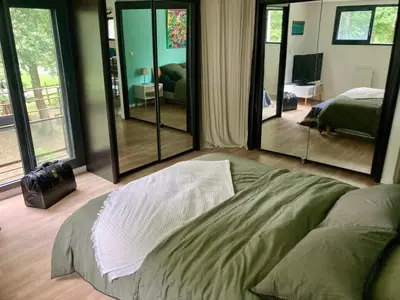 Un ou plusieurs lits dans un hébergement de l'établissement LOFT au calme proche ZOO