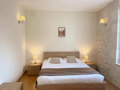 Un ou plusieurs lits dans un hébergement de l'établissement Gîte en Val de Loire: confort, jardin, parking et WiFi inclus - FR-1-491-452