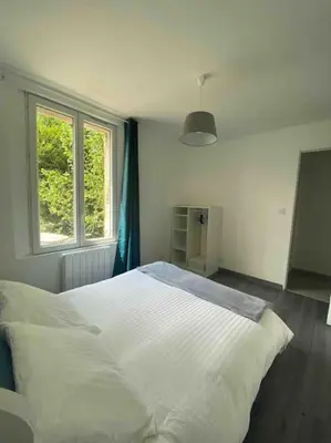 Un ou plusieurs lits dans un hébergement de l'établissement Gîte à louer 70 m2
