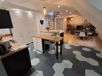 Cuisine ou kitchenette dans l'établissement Appartement spacieux centre ville parking privé