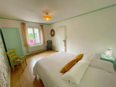 Un ou plusieurs lits dans un hébergement de l'établissement Gîte familial spacieux près de Villandry, avec jardin, pétanque et WIFI - FR-1-381-595