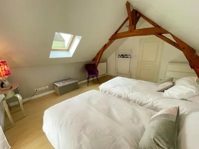 Un ou plusieurs lits dans un hébergement de l'établissement Gîte familial spacieux près de Villandry, avec jardin, pétanque et WIFI - FR-1-381-595