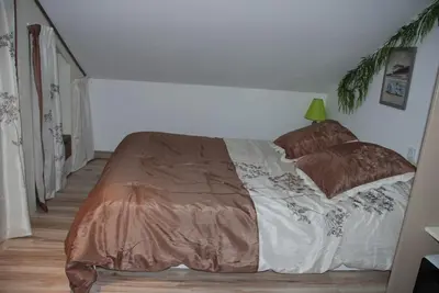 Un ou plusieurs lits dans un hébergement de l'établissement Maison entière 5 chambres à 10mn à pied de l'entrée principale du Circuit 24h Du Mans