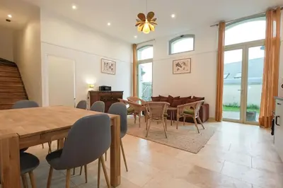 Coin salon dans l'établissement Magnifiques Ecuries juste rénovées - Domaine de la Mulotière
