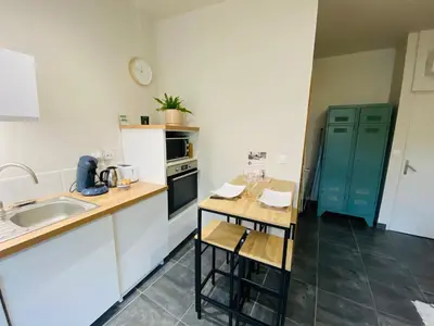 Cuisine ou kitchenette dans l'établissement Le Petit Francillon