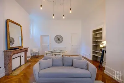 Coin salon dans l'établissement Le Wilson - Proche Centre Ville