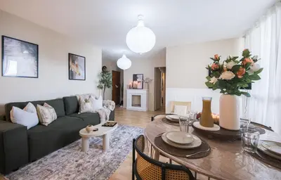 Coin salon dans l'établissement Appartement avec Rétroprojecteur, Babyboot avec belle vue et proche gare