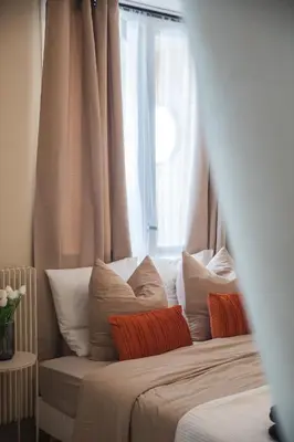 Un ou plusieurs lits dans un hébergement de l'établissement Appartement avec Rétroprojecteur, Babyboot avec belle vue et proche gare