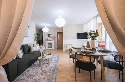 Coin salon dans l'établissement Appartement avec Rétroprojecteur, Babyboot avec belle vue et proche gare