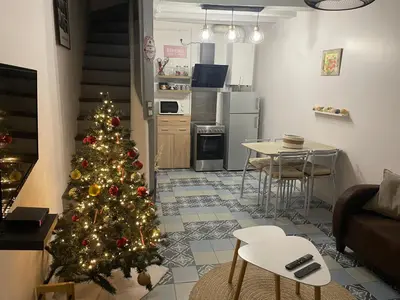 Cuisine ou kitchenette dans l'établissement Jolie Maison de Ville