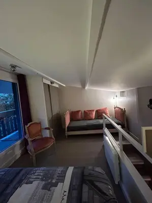 Un ou plusieurs lits dans un hébergement de l'établissement Le chalet sous les arbres