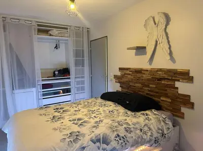 Un ou plusieurs lits dans un hébergement de l'établissement Superbe Maison familiale