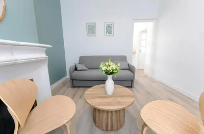 Coin salon dans l'établissement La Mancelle - 6 Personnes - Plein cœur du Mans