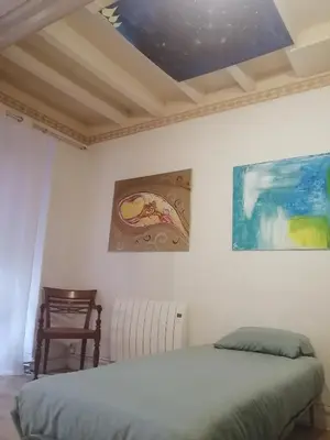 Un ou plusieurs lits dans un hébergement de l'établissement Relais Art Bien-Etre Lumineux Doué en Anjou