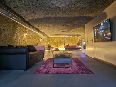 Coin salon dans l'établissement Troglodyte Loft