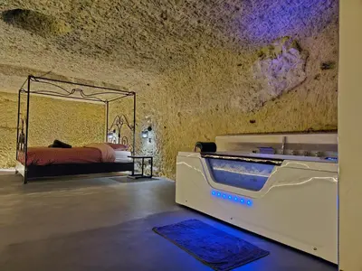 Un ou plusieurs lits dans un hébergement de l'établissement Troglodyte Loft