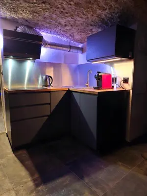 Cuisine ou kitchenette dans l'établissement Troglodyte Loft