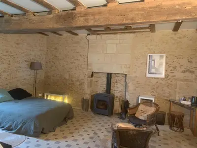 Un ou plusieurs lits dans un hébergement de l'établissement une chambre à la campagne