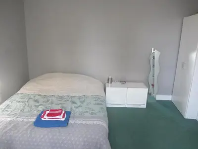 Un ou plusieurs lits dans un hébergement de l'établissement Chez Annie Chambre chez l'habitant