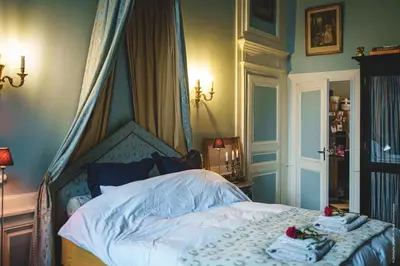 Un ou plusieurs lits dans un hébergement de l'établissement Hôtel particulier Hôtel Blancler