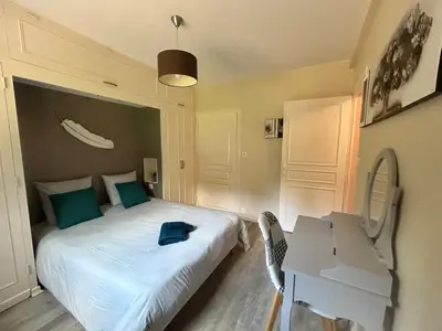 Un ou plusieurs lits dans un hébergement de l'établissement L'Harmonie Evénements House