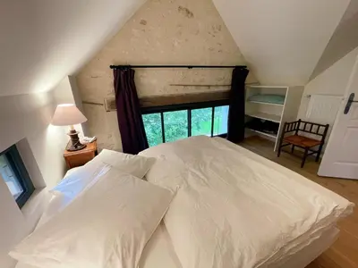 Un ou plusieurs lits dans un hébergement de l'établissement Gîte de charme en Touraine avec jardin, proche châteaux de la Loire - FR-1-381-598