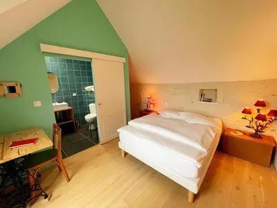 Un ou plusieurs lits dans un hébergement de l'établissement Gîte de charme en Touraine avec jardin, proche châteaux de la Loire - FR-1-381-598