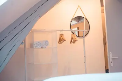 Salle de bains dans l'établissement Le Nid dAigle - Spacieux logement sous les toits