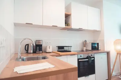 Cuisine ou kitchenette dans l'établissement Le Friendly - Convivial & Chill