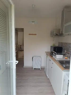 Cuisine ou kitchenette dans l'établissement Logement indépendant