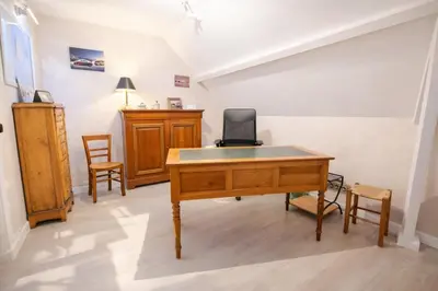 Télévision ou salle de divertissement dans l'établissement Les Paillotes de la Haute Mazère