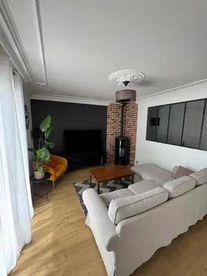 Coin salon dans l'établissement Maison 3ch avec garage
