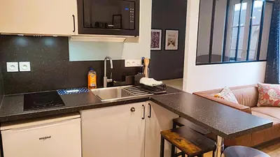 Cuisine ou kitchenette dans l'établissement Le Douillet Cocon - Centre
