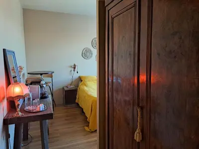Un ou plusieurs lits dans un hébergement de l'établissement chambre cosy en centre ville avec accès indépendant