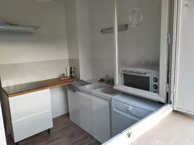 Cuisine ou kitchenette dans l'établissement Séjours des Rossignols
